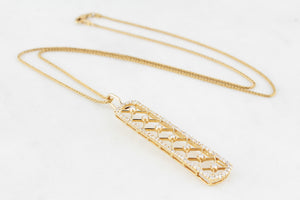 CONTEMPORARY .95ct DIAMOND PENDANT IN 18ct GOLD