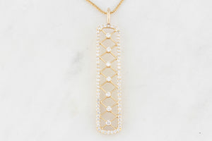 CONTEMPORARY .95ct DIAMOND PENDANT IN 18ct GOLD