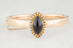ANTIQUE EDWARDIAN GARNET & SEED PEARL BANGLE 9CT GOLD