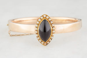 ANTIQUE EDWARDIAN GARNET & SEED PEARL BANGLE 9CT GOLD