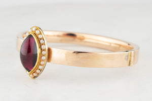 ANTIQUE EDWARDIAN GARNET & SEED PEARL BANGLE 9CT GOLD