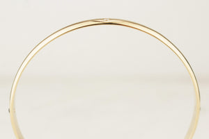 CONTEMPORARY DIAMOND & SPINEL BANGLE 9ct GOLD