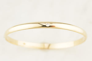 CONTEMPORARY DIAMOND & SPINEL BANGLE 9ct GOLD