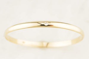 CONTEMPORARY DIAMOND & SPINEL BANGLE 9ct GOLD