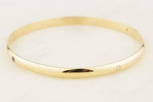 CONTEMPORARY DIAMOND & SPINEL BANGLE 9ct GOLD