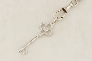 MODERN DIAMOND KEY PENDANT 18ct WHITE GOLD