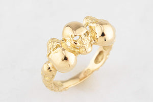 CONTEMPORARY 18ct GOLD TRIPLE SKULL RING