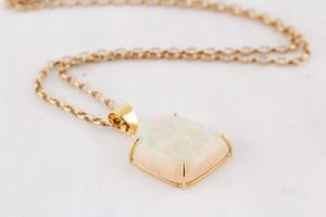 CONTEMPORARY SOLID FREE FORM OPAL PENDANT 18ct GOLD