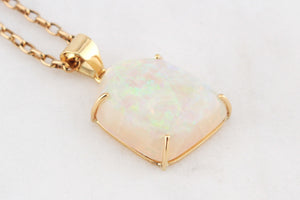 CONTEMPORARY SOLID FREE FORM OPAL PENDANT 18ct GOLD
