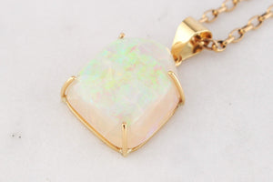 CONTEMPORARY SOLID FREE FORM OPAL PENDANT 18ct GOLD