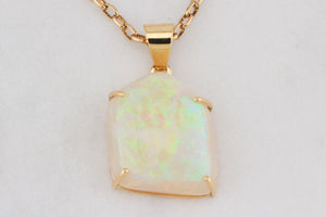 CONTEMPORARY SOLID FREE FORM OPAL PENDANT 18ct GOLD