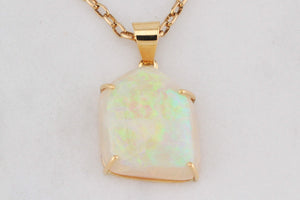 CONTEMPORARY SOLID FREE FORM OPAL PENDANT 18ct GOLD