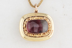 ANTIQUE MOURNING LOCKET WITH GARNET HEART 9ct GOLD