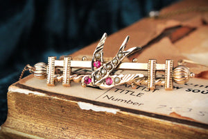 ANTIQUE AUSTRALIAN RUBY AND SEED PEARL SWALLOW BROOCH 9ct GOLD