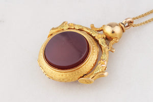 ANTIQUE VICTORIAN DOUBLE SIDED CARNELIAN SPINNING FOB LOCKET 15ct GOLD