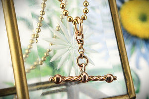 ANTIQUE SPINNING T-BAR PENDANT 9ct GOLD