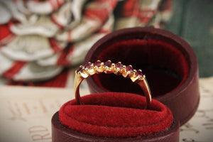 VINTAGE SEVEN STONE RUBY HALF HOOP 14CT YELLOW GOLD