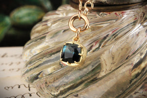 BESPOKE BI-COLOUR TEAL TOURMALINE 9CT GOLD
