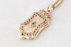 VINTAGE PERIDOT SHIELD PENDANT 9ct GOLD