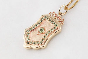 VINTAGE PERIDOT SHIELD PENDANT 9ct GOLD
