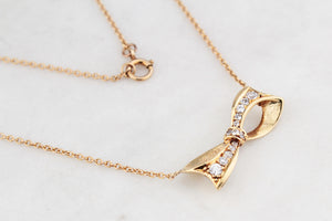VINTAGE .32ct DIAMOND BOW NECKLACE 18ct & 9ct GOLD