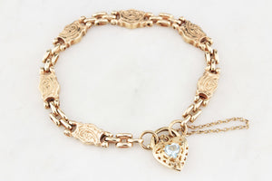 ANTIQUE EDWARDIAN ETCHED LINK BRACELET WITH FILIGREE TOPAZ HEART 9ct GOLD