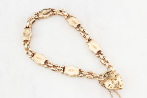 ANTIQUE EDWARDIAN ETCHED LINK BRACELET WITH FILIGREE TOPAZ HEART 9ct GOLD