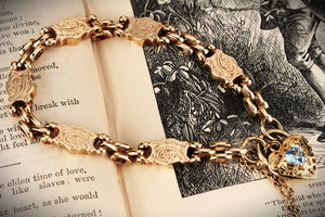 ANTIQUE EDWARDIAN ETCHED LINK BRACELET WITH FILIGREE TOPAZ HEART 9ct GOLD