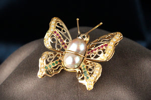 VINTAGE BUTTERFLY PENDANT WITH EMERALDS, RUBIES, DIAMONDS & PEARL 14ct GOLD