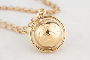 VINTAGE SPINNING GLOBE PENDANT 9ct GOLD