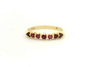 VINTAGE SEVEN STONE RUBY HALF HOOP 14CT YELLOW GOLD