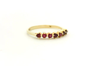 VINTAGE SEVEN STONE RUBY HALF HOOP 14CT YELLOW GOLD