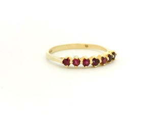 VINTAGE SEVEN STONE RUBY HALF HOOP 14CT YELLOW GOLD