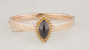 ANTIQUE EDWARDIAN GARNET & SEED PEARL BANGLE 9CT GOLD