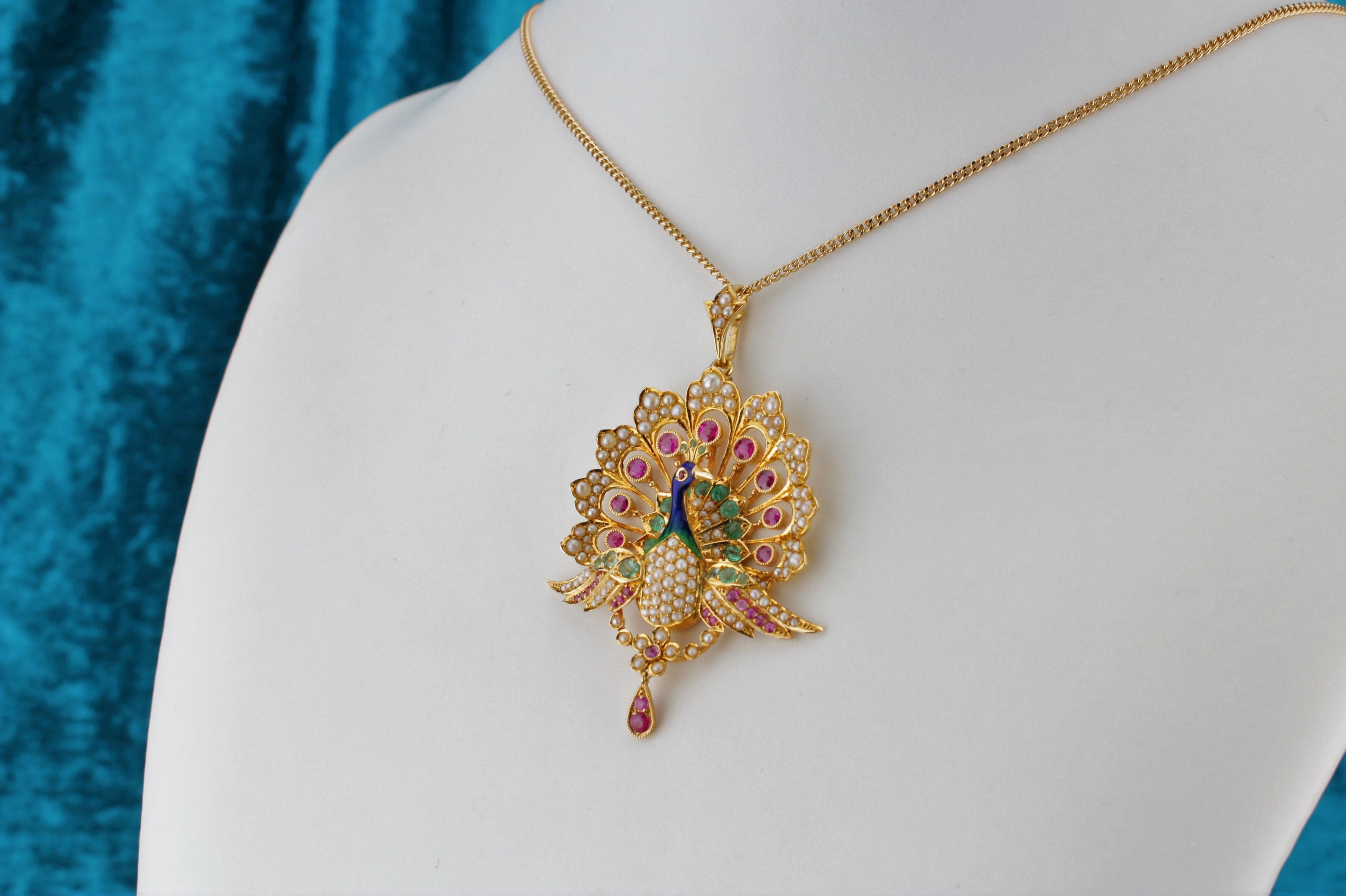 Gold chain with peacock shop pendant