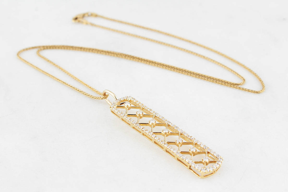 CONTEMPORARY .95ct DIAMOND PENDANT IN 18ct GOLD