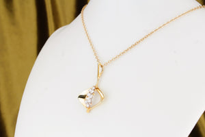 VINTAGE c1940 .64ct DIAMOND PENDANT ON 14ct YELLOW GOLD