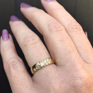 CONTEMPORARY DIAMOND BAND RING ON 18ct YELLOW GOLD