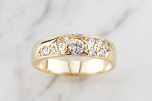 CONTEMPORARY DIAMOND BAND RING ON 18ct YELLOW GOLD