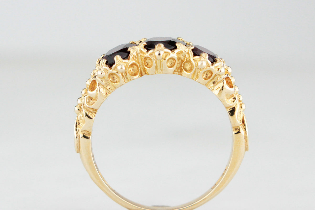 RETRO 1974 GARNET TRILOGY RING 9CT GOLD