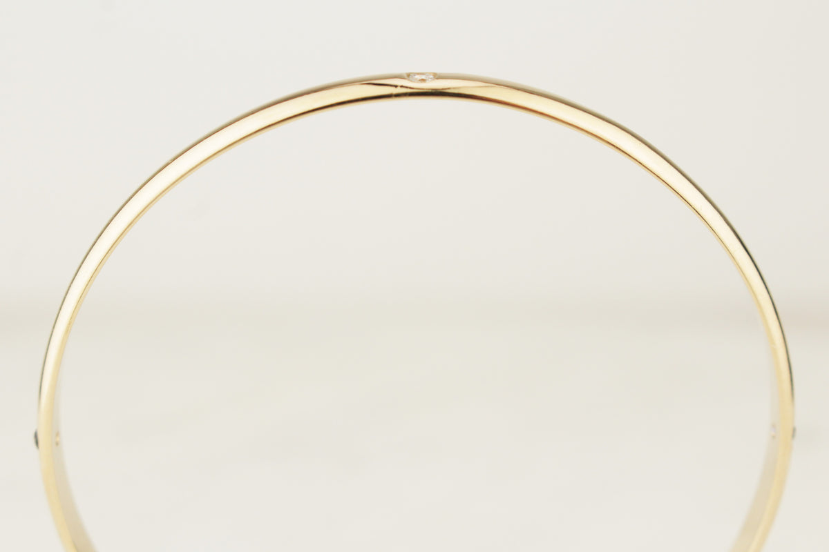 CONTEMPORARY DIAMOND &amp; SPINEL BANGLE 9ct GOLD