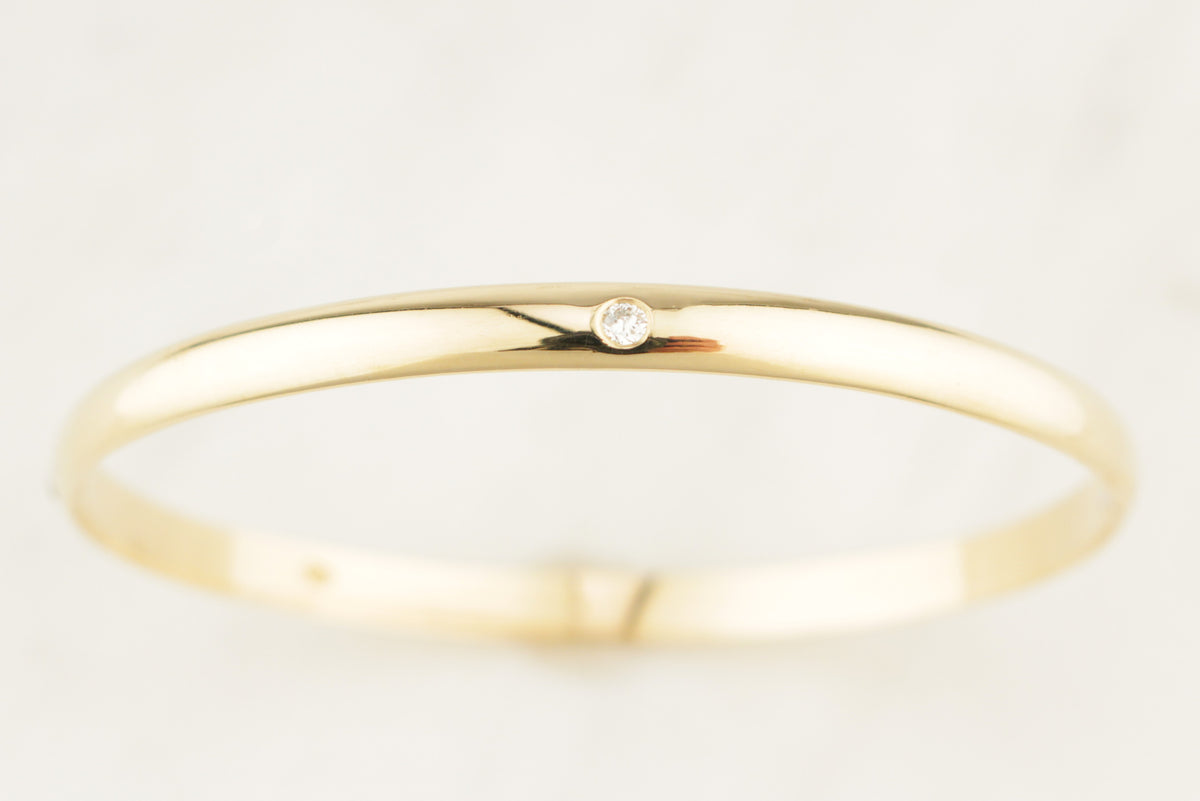 CONTEMPORARY DIAMOND &amp; SPINEL BANGLE 9ct GOLD