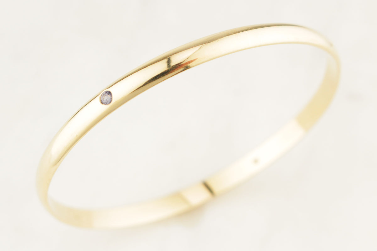 CONTEMPORARY DIAMOND &amp; SPINEL BANGLE 9ct GOLD
