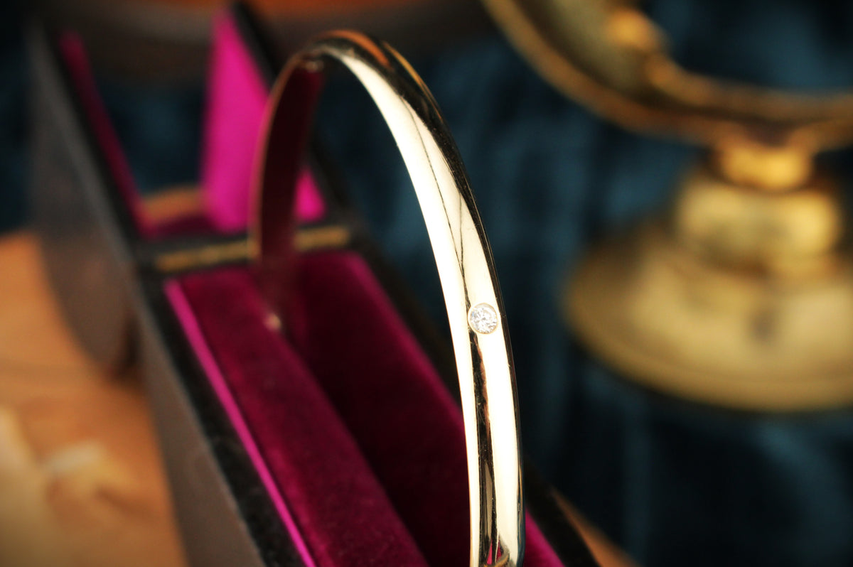 CONTEMPORARY DIAMOND &amp; SPINEL BANGLE 9ct GOLD