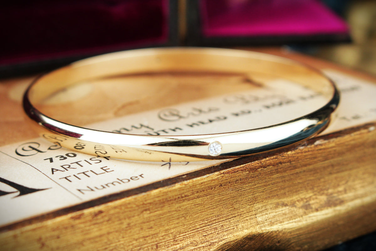 CONTEMPORARY DIAMOND &amp; SPINEL BANGLE 9ct GOLD