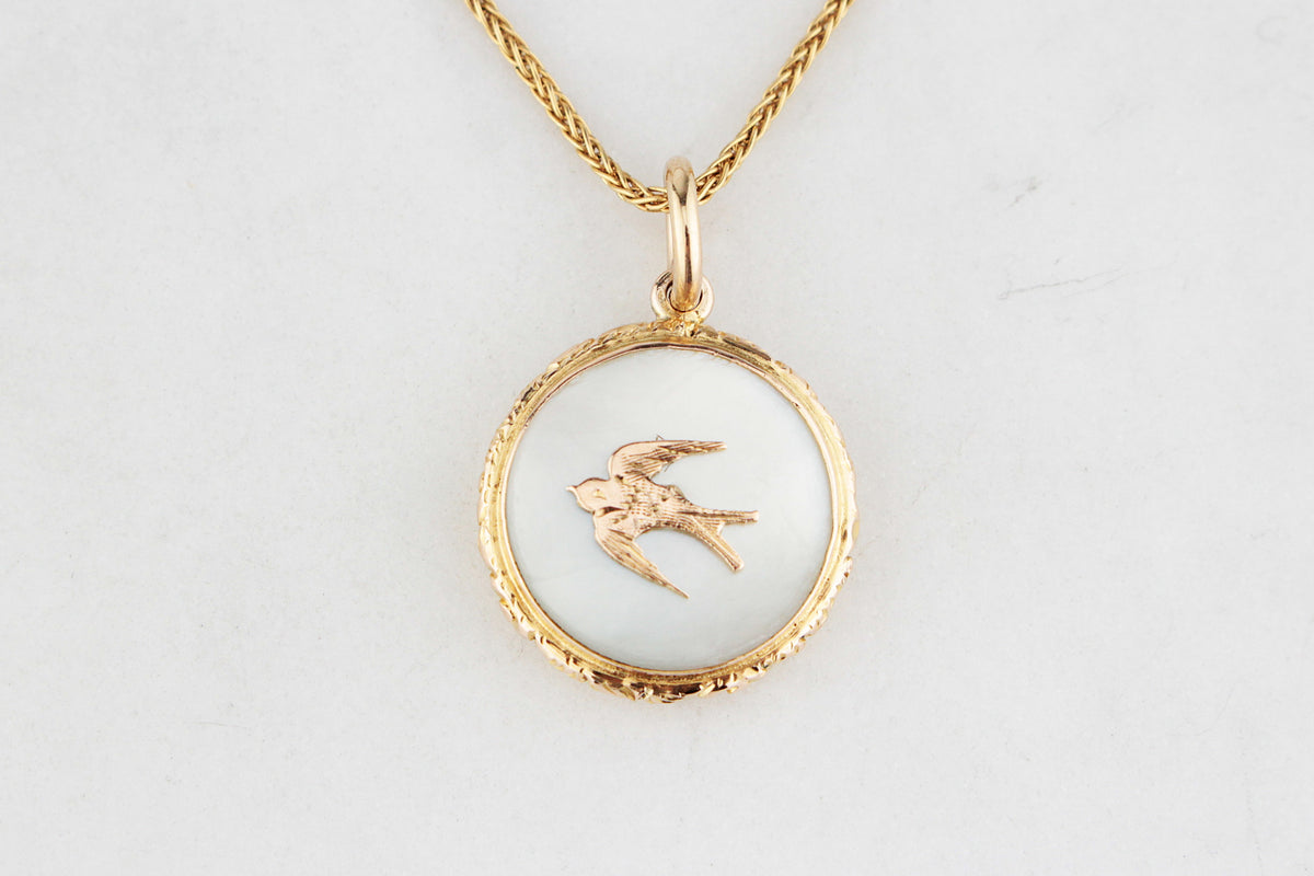 ANTIQUE EDWARDIAN MOTHER OF PEARL SWALLOW PENDANT 9ct GOLD