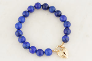 LAPIS LAZULI BRACELET WITH ANTIQUE 9ct GOLD HEART LOCKET