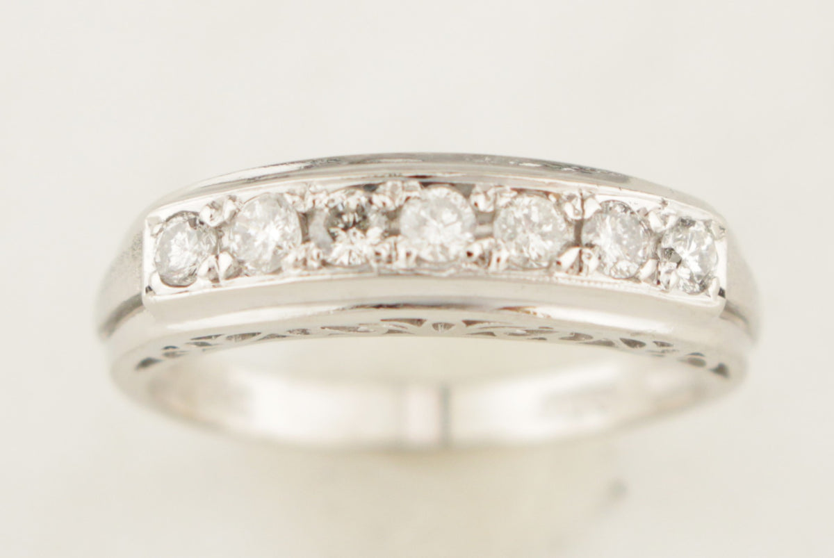 VINTAGE ESTATE SEVEN STONE DIAMOND PLATINUM RING