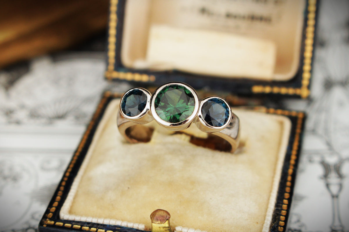 CONTEMPORARY SAPPHIRE TRILOGY RING 18ct WHITE GOLD