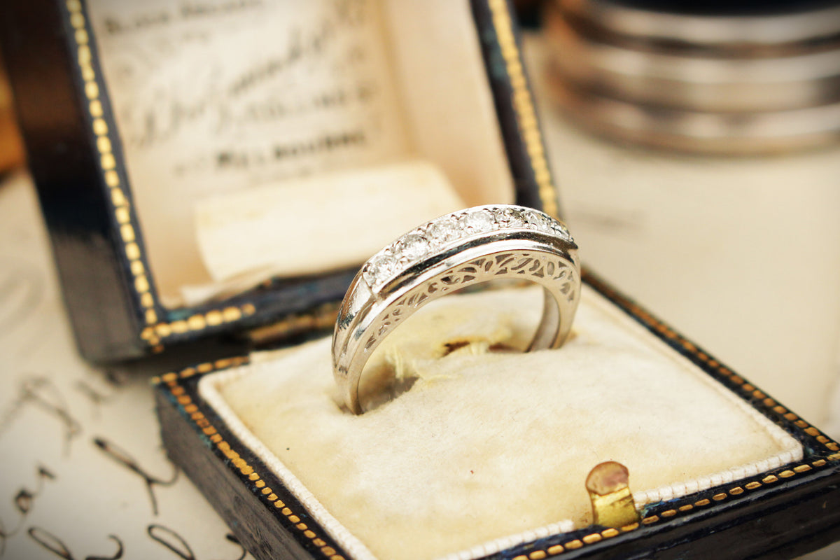 VINTAGE ESTATE SEVEN STONE DIAMOND PLATINUM RING